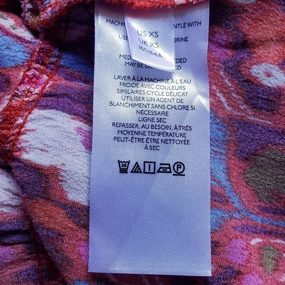 Anthropologie Robin Tiered Mini Dress Pink Ikat Flutter Sleeve Ruffle Size XS - Picture 14 of 14